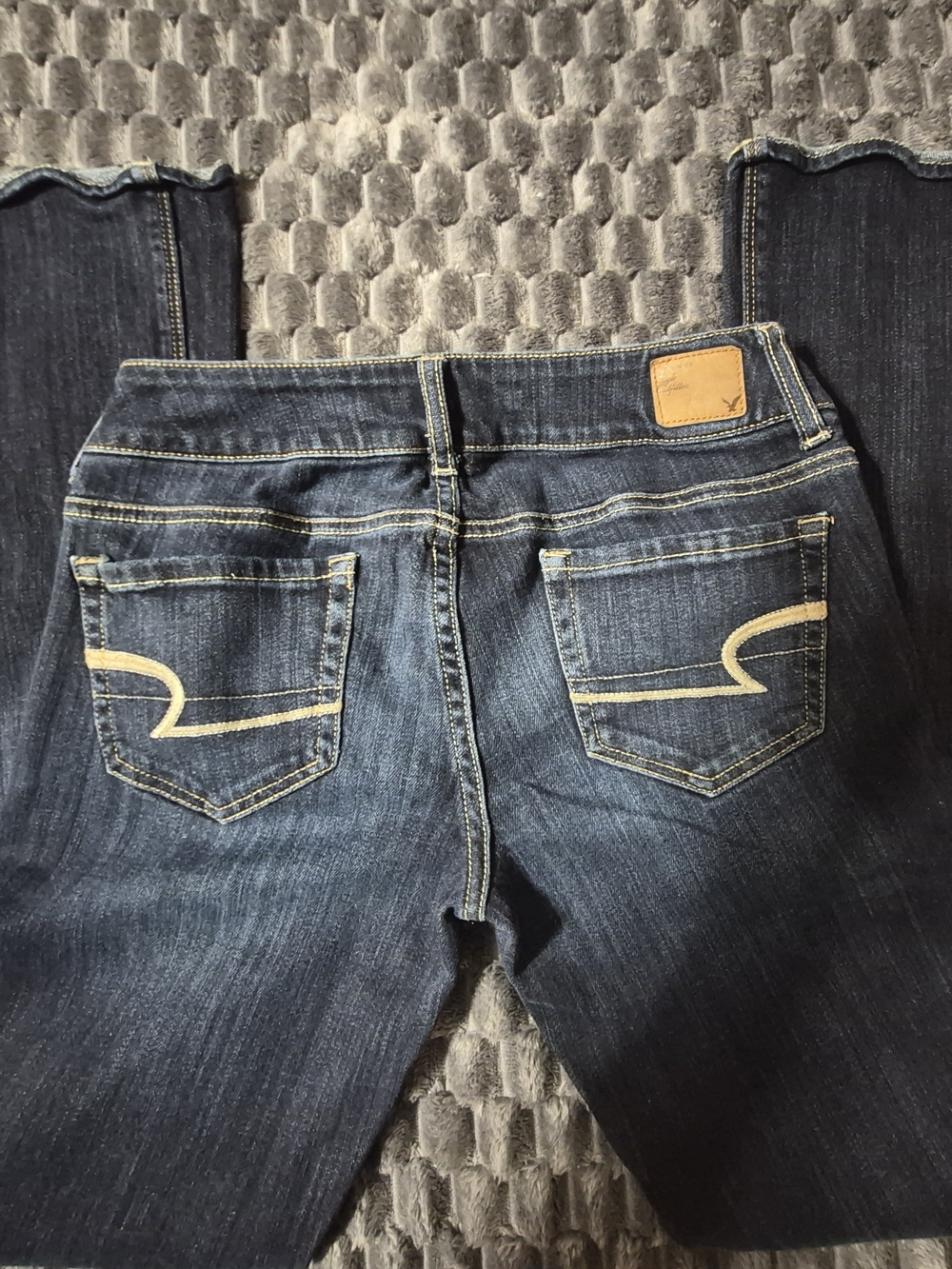 American Eagle Outfitters Dark Blue Bootcut Jeans with Tan Stitching